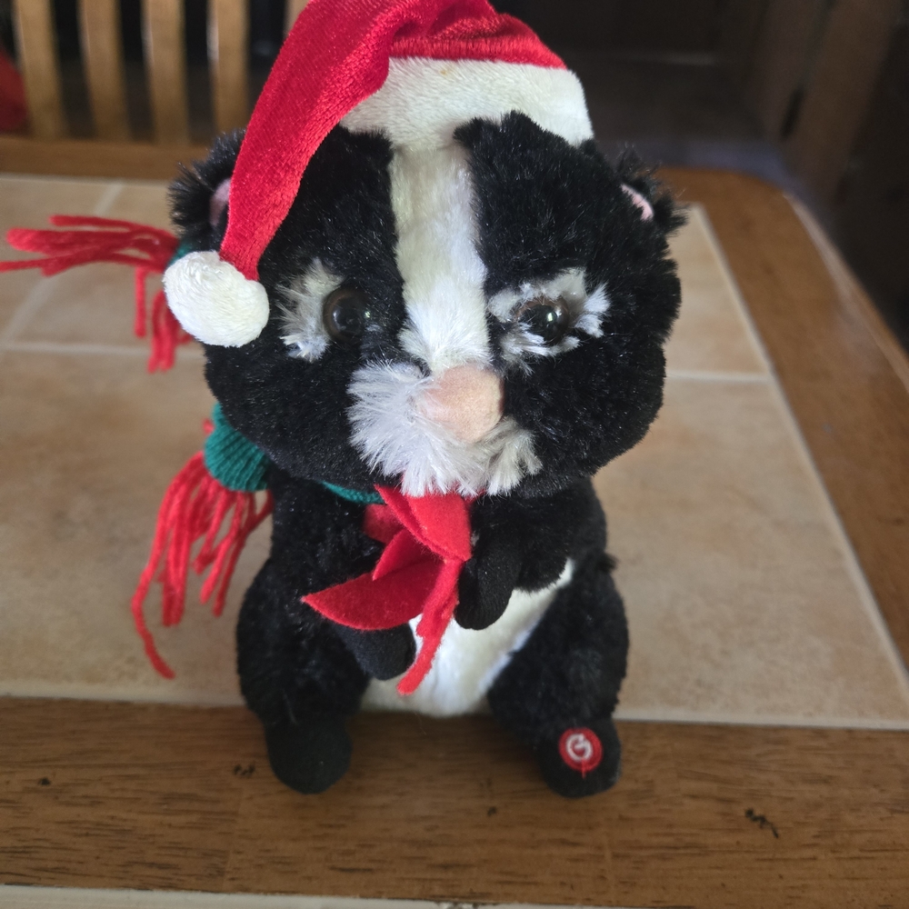 Funny Musical Skunk Plush Toy with Santa Hat